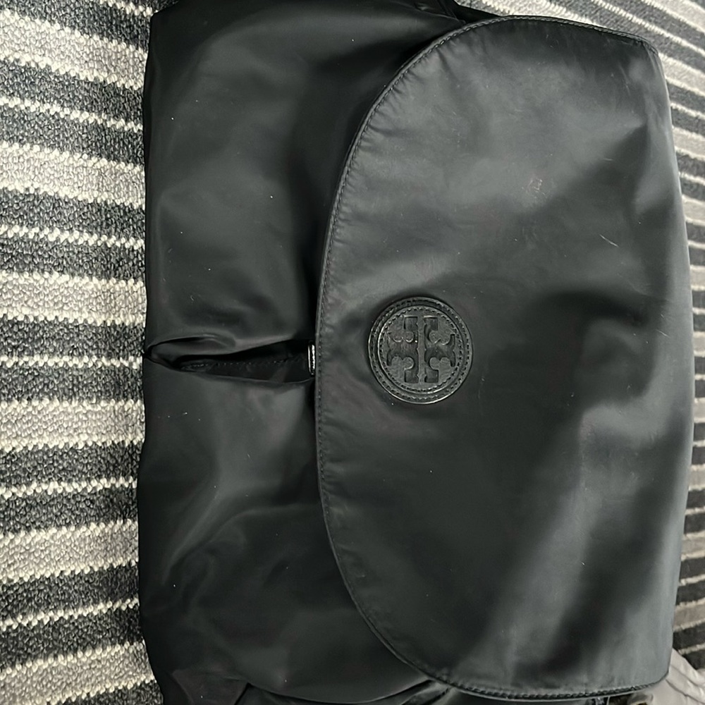Tory Burch diaper bag. Gently used. black. Includes changing pad.